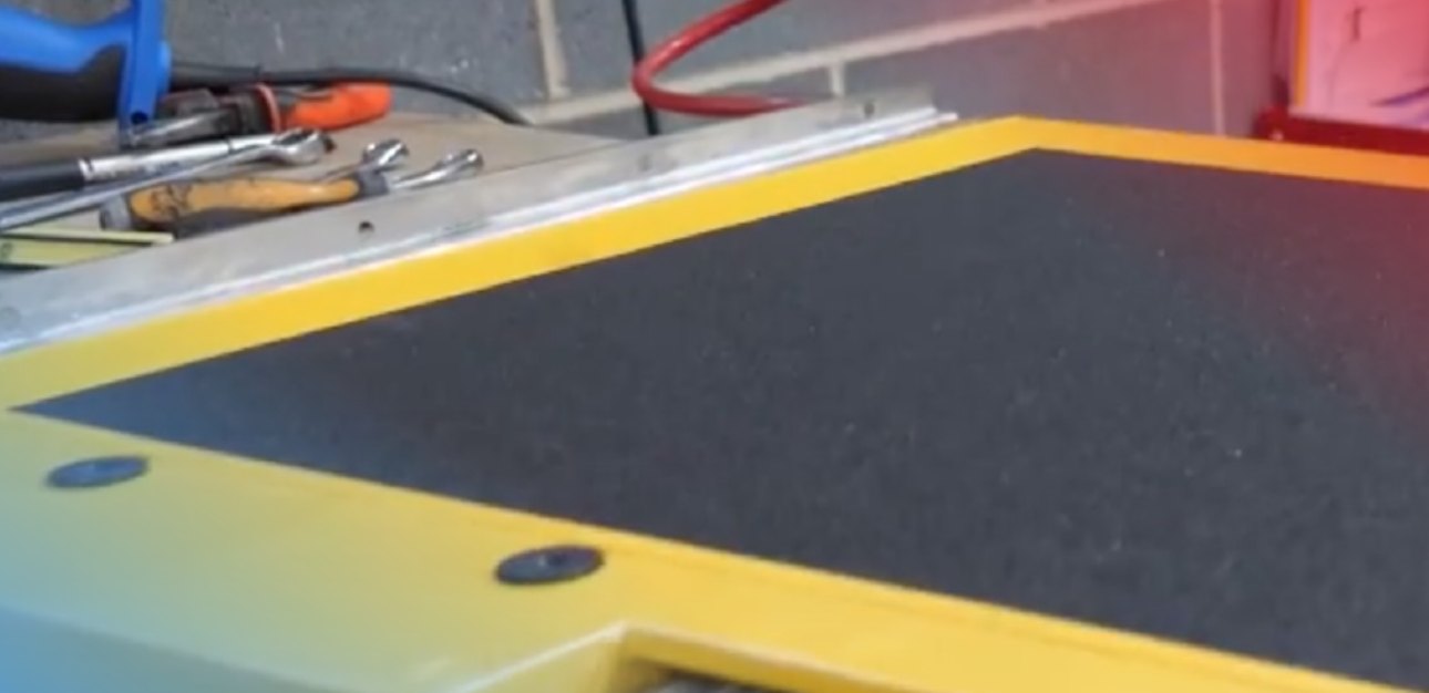 Close-up of a Compak ramp edge on the workbench during manufacture